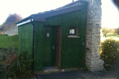 Golf Club Toilet With Artificial Hedging