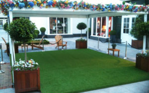 Artificial grass for exhibits and retail
