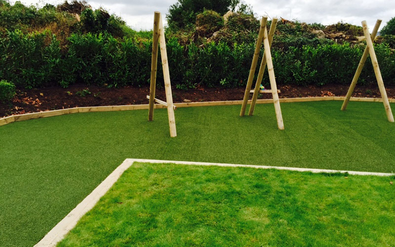 Artificial grass perfect for play areas.