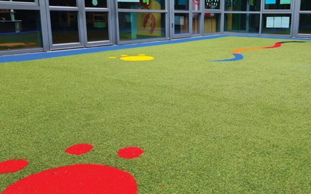 artificial grass over School hard court yard