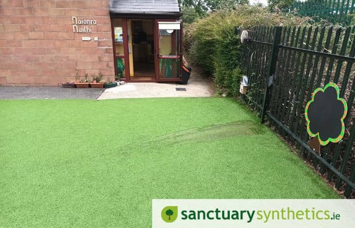 Artificial grass burn from reflection of glass on hot day